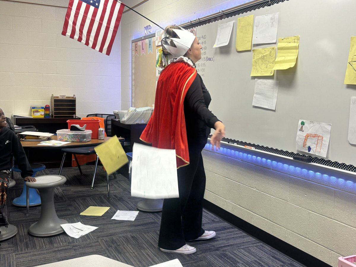 GriderBrittany's tweet photo. “Hello, my most loyal citizens.” 👑When a 3rd grade teacher asks you to be a pretend dictator for their government simulation, you say ABSOLUTELY! What they don’t know: you’re going OFF SCRIPT. 🤣

“That is my final decision!” 
#AssistantPrincipal #KCKPS https://t.co/Ie5ZK7hDX9
