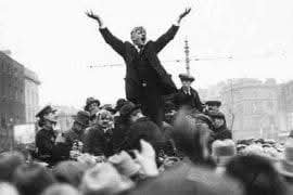 RobLooseCannon's tweet photo. Today in 1913 the Dublin Lockout began, the greatest industrial struggle in Irish history. At its heart stood two men. William Martin Murphy was one of the city’s most powerful employers. And James a"Big Jim" Larkin, the fiery leader of the Irish Transport and General Workers’ Union (ITGWU).

Murphy was also a former MP for Dublin and chairman of the Dublin United Tramway Company (DUTC) so he had watched with alarm as Larkin recruited his employees into the union. He believed that “Larkinism” threatened not only his business but the whole foundation of employer authority in Dublin. 

In July, Murphy summoned tram workers to a midnight meeting at the Antient Concert Hall. His message was blunt. Resign from the ITGWU, or lose your jobs. When many refused, Murphy began dismissing them one by one, targeting not only tram men but also employees of his other ventures, including Independent Newspapers.

For a time, Larkin held back. He knew that a strike against Murphy would be perilous, but the pressure from union members was overwhelming. On the 25th of August 1913, a ballot was held at Liberty Hall, the ITGWU headquarters. 

The next morning, as trams rattled through the streets at the height of the Dublin Horse Show, nearly 200 drivers and conductors abandoned their vehicles, leaving them standing in the road with bewildered passengers still inside. The strike had begun. 

Murphy struck back instantly, locking out the strikers and vowing not to employ anyone connected with the ITGWU. Other employers quickly joined him, from the Dublin Coal Merchants’ Association to the Carriers’ Association, which even sacked men for refusing to handle “tainted goods” touched by union hands.

The dispute quickly spilled from the workplace into the streets. On Sunday the 31st of August, Larkin himself tried to outwit the police by disguising himself and slipping into Murphy’s Imperial Hotel on Sackville Street. From a first floor balcony he addressed a roaring crowd, but his triumph was short lived. Police baton-charged the gathering with brutal force, joined by members of the Royal Irish Constabulary. Larkin was arrested, and the day passed into memory as yet another “Bloody Sunday” in Irish history.

The Lockout dragged on for five bitter months. In total, 20,000 workers were involved, while tens of thousands of their families endured desperate poverty and hunger. Larkin toured England, appealing for solidarity, but received little in return. By the 18th of January 1914, the ITGWU admitted defeat and advised men to return to work. 

Larkin told his followers “We are beaten, we will make no bones about it.” Yet the legacy of Larkin and the heroism of the revolting workers and their families would not be forgotten.