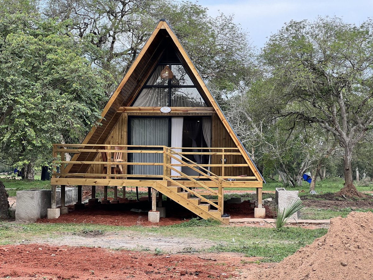 CallMeKulubya's tweet photo. Yesterday I spent the full day in the wild to inspect the A-frames we have built at Ziwa Rhino Sanctuary. We put 4 cabins here and we are the first to do it in Uganda at an international standard. https://t.co/UbQ7Yg3aiR