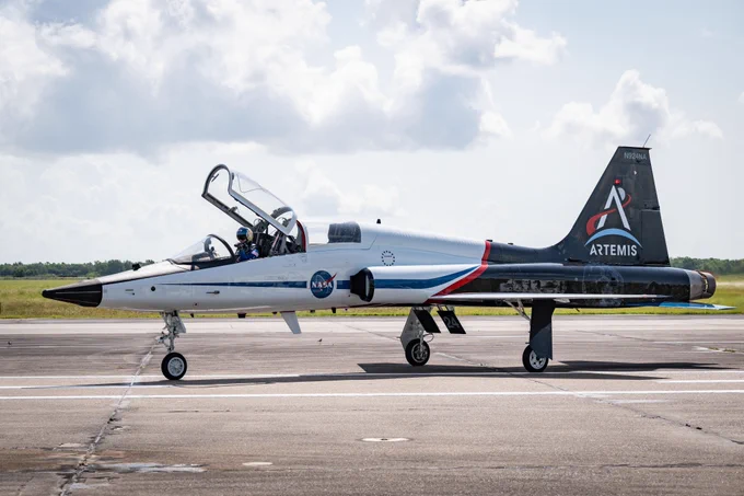 A NASA T-38 jet with the new Artemis paint scheme sits on the runway at Ellington Field in Houston, Texas. Photo: NASA/James Blair