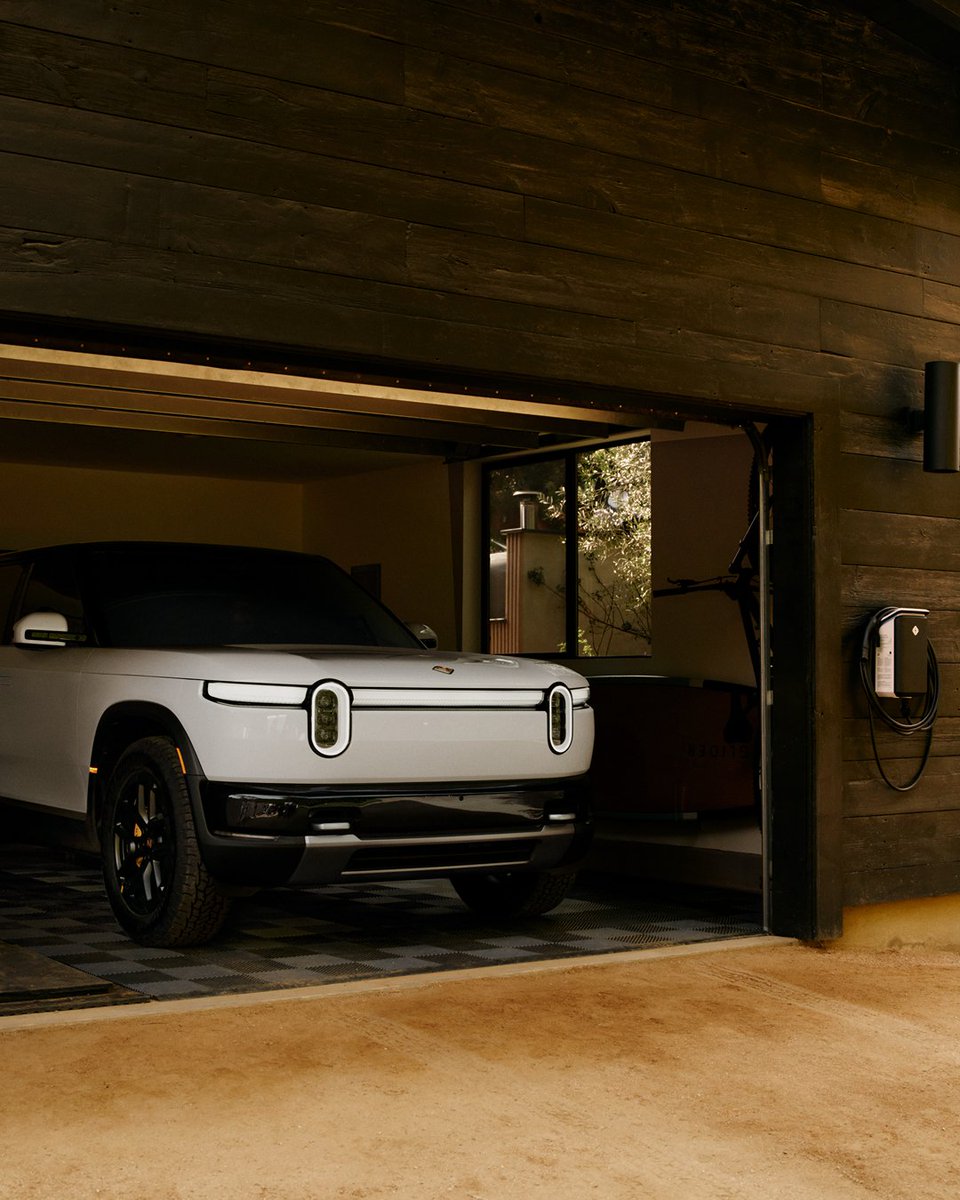 Rivian's tweet photo. Plug in when you get home. Wake up ready. The Rivian Wall Charger adds up to 38 miles of range per hour, so your vehicle is charged and waiting for whatever the day brings. Once you never have to visit a gas station again, there's no going back. 

Learn more at https://t.co/chPpXj67tW

*Charging speeds vary and reflect optimal conditions.