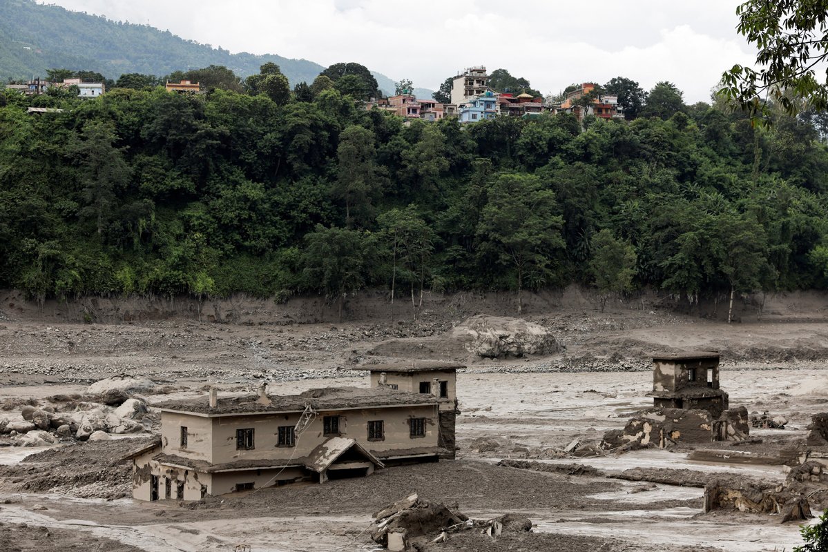 ChinaDailyEU's tweet photo. A massive flood and landslide disaster on the Nepal-Tibet border killed at least 160 people on Wednesday and left several hundred missing, many of them foreign tourists. 
According to Nepal's tourism ministry, the missing foreigners included 142 Indians, and others from Australia, Britain, Malaysia, the Netherlands, Portugal, South Africa, South Korea and the United States.