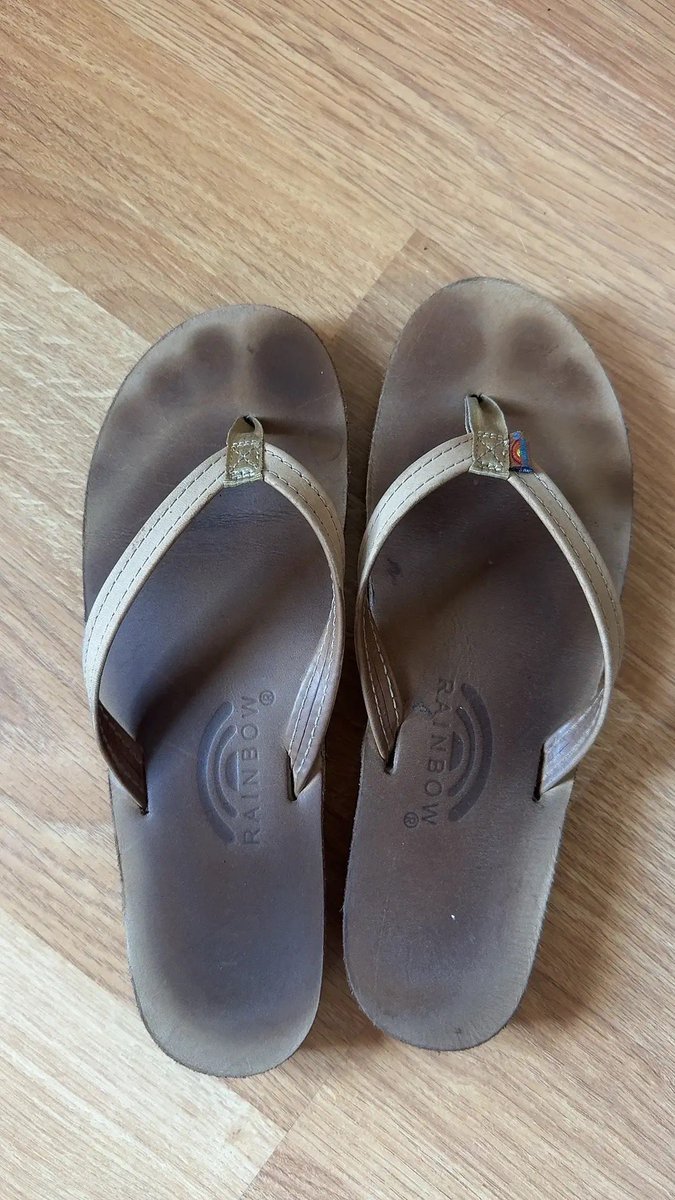 urfavvbalqueen's tweet photo. Selling my smelly rainbow flip flops I’ve owned for 3 years :) primarily wear these right after volleyball so they are darkened with my foot sweat and very stinky https://t.co/KnER1SisBw