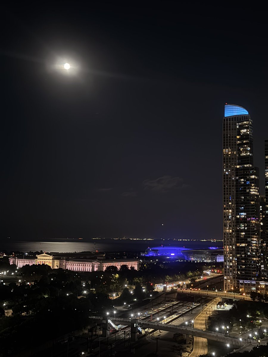 kdope85's tweet photo. Look at this view! Full moon lighting up Lake Michigan, and the stadium is purple! 💜👀 https://t.co/zIg7JQMyqk