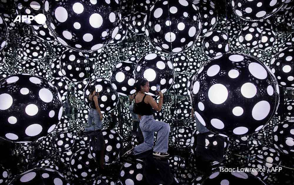 AFP's tweet photo. Japan's 'polka dot queen' artist Yayoi Kusama dies aged 97.

One of the world's most celebrated contemporary artists, Kusama channelled hallucinations and trauma into vibrant art featuring her trademark dots, nets and infinity motifs over a career spanning decades
https://t.co/jgkNQtfGNC