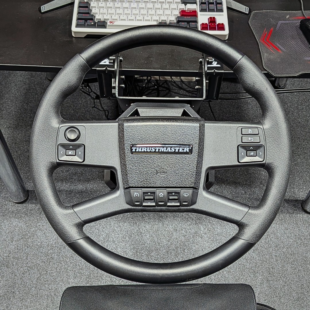 TMThrustmaster's tweet photo. 📍 Spotted at @SCSsoftware booth at gamescom!

The new SimTask Truck-40 Add-On Kit is already on the road, giving visitors the chance to get behind the wheel and experience trucking like never before. 🚛

If you’re at #gamescom2026, make sure to stop by and give it a try!

Who’s getting behind the wheel? 👀