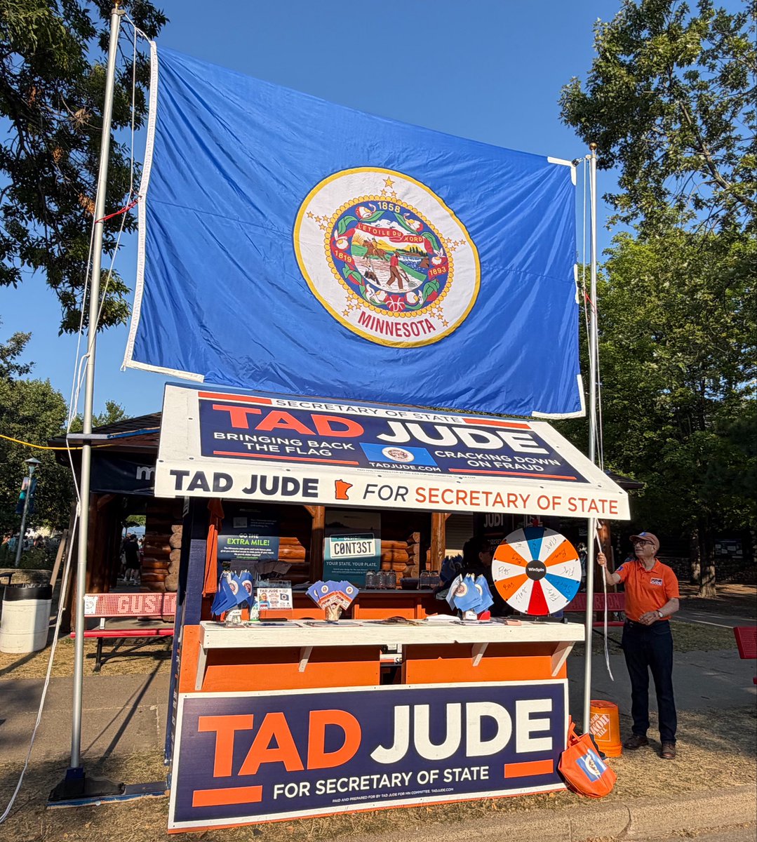 TadJudeMN's tweet photo. And our Historic Minnesota Flag is officially raised!  Come see it flying proudly at the Tad Jude @mnstatefair booth, located by the DNR park! Stop by and join #TeamJude at the Great Minnesota Get-Together! 🎡🗳️✅
#MNStateFair #MNSOS https://t.co/1uEjr5N5HO