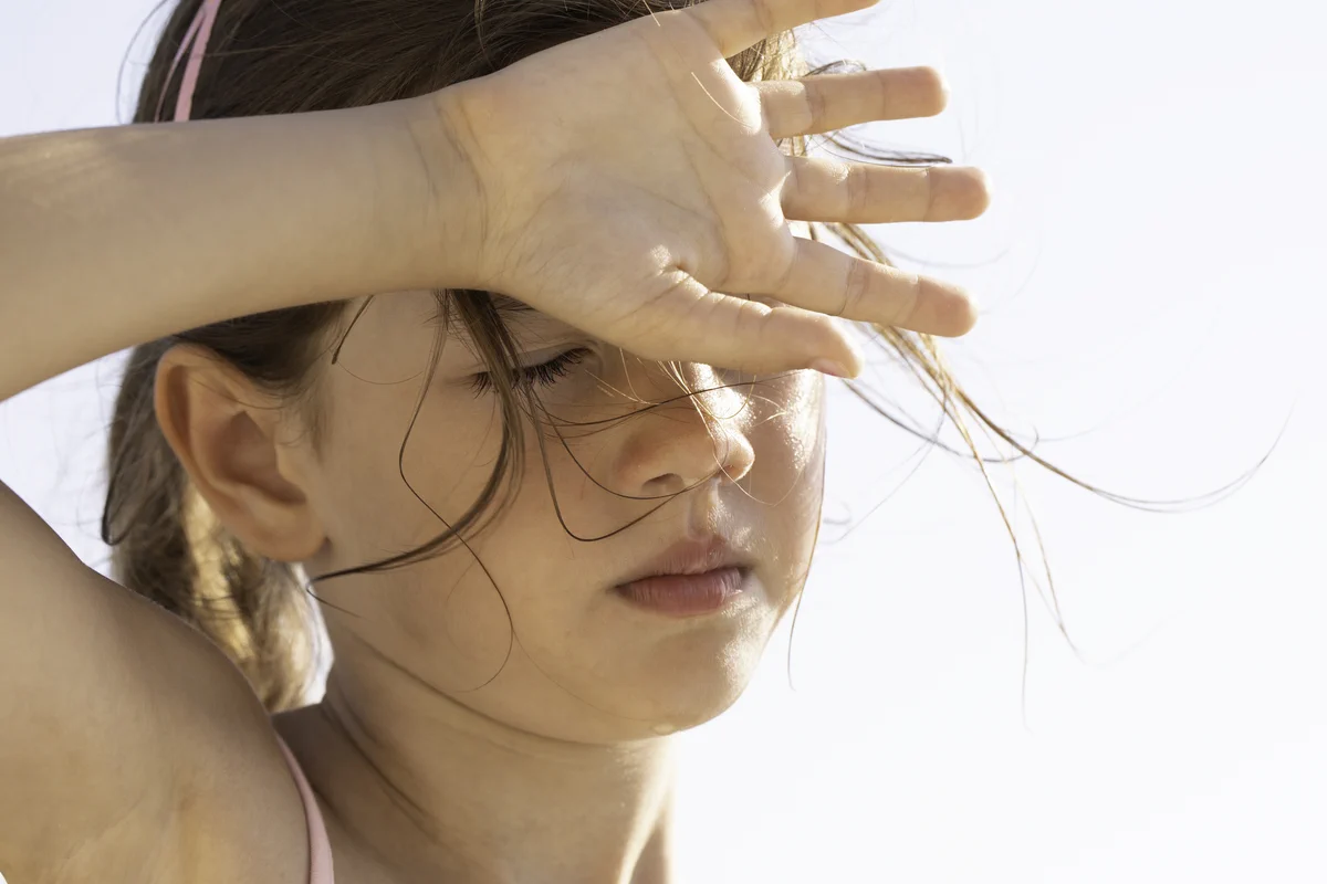 Child outside in hot weather
