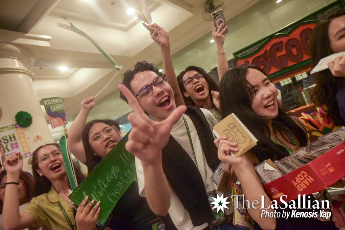 TheLaSallian's tweet photo. HAPPENING NOW: Incoming frosh from GCOE, TDSOL, SIS, and BAGCED end their #LPEP2K26 journey with the annual Frosh Walk, running through Yuchengco Grounds to cheers from various student organizations. https://t.co/Ecrqo0DEbc
