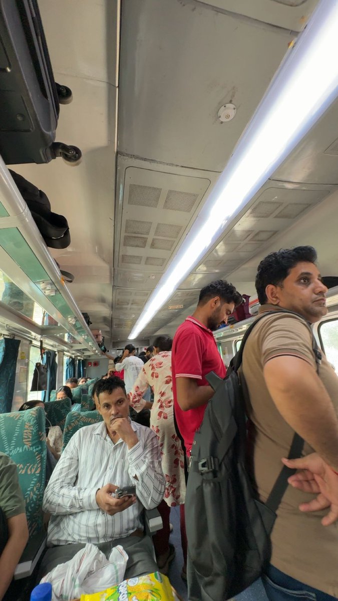 AchintKaur11's tweet photo. @IRCTCofficial 27aug26 DLI to HSR (Kisan express-2pm). People r standing n there's no space for going to washroom, exit, etc. We paid 4 comfort, we booked 1month before.
What is this? @IndiaRailNews pls take immediate action. https://t.co/irTodG0uIa