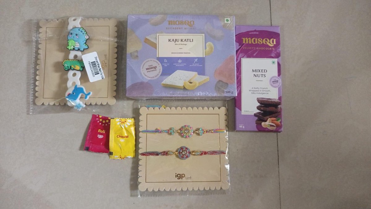 nk_yogesh's tweet photo. @IGPcom  Order  #19594141 which I have placed  for Rakhi hamper yesterday .
 I have received wrong items , also I need urgent assistance to deliver right product for which I have placed the orders
Please see images of received items and what was ordered items. https://t.co/msrWCRF81M