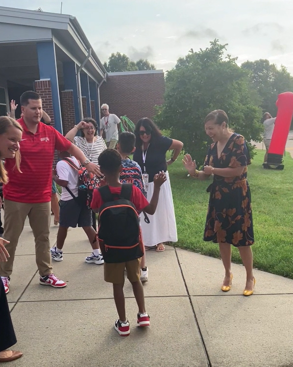 RIDeptEd's tweet photo. Another wonderful morning of #Back2SchoolRI visits! 📚 🍎 

Commissioner @AInfanteGreen was so excited to join educators and staff at the Rhode Island School for the Deaf to welcome back students and celebrate the 150th year of the school! 🎉 

#AttendanceMattersRI @RISDEAF https://t.co/UukJNcAChb