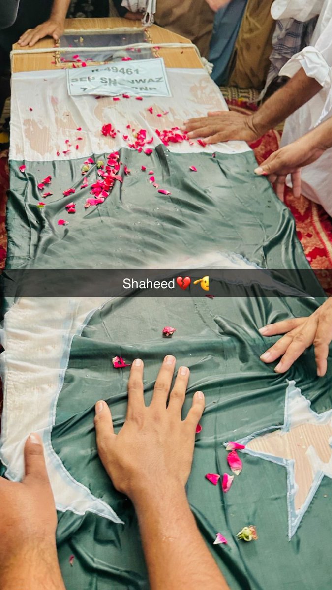 RaheelNaich07's tweet photo. @NewsSource01 @GFarooqi Look at this photo of our martyr Sepoy Shah Nawaz Naich wrapped in the national flag. Anyone using a soldier's supreme sacrifice for fake online propaganda should hang their head in shame. His honor is far greater than your political lies. https://t.co/WA0J3zKALU