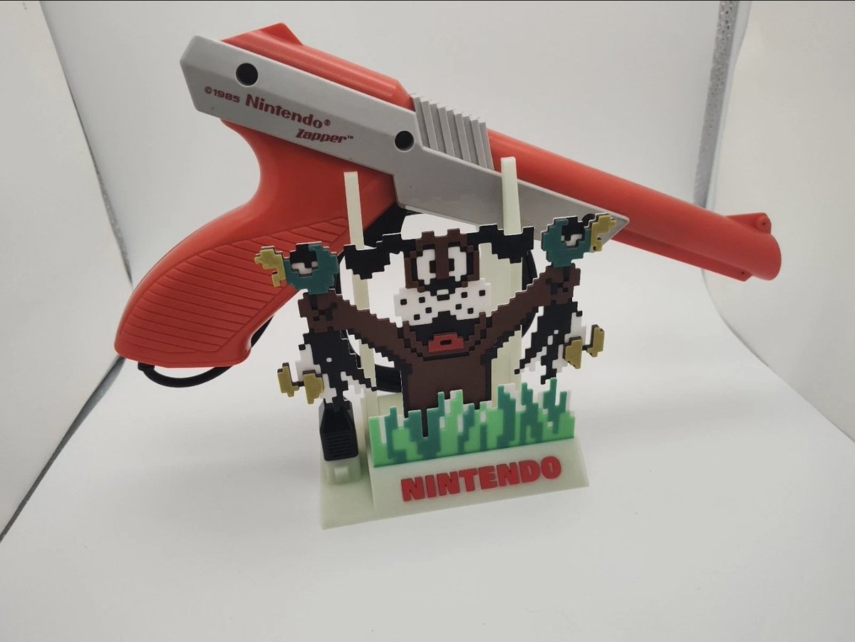 XRPee1983's tweet photo. This damn NES Zapper stand is truly epic. Very creative stuff!

#Nintendo https://t.co/scUHvVmoqL