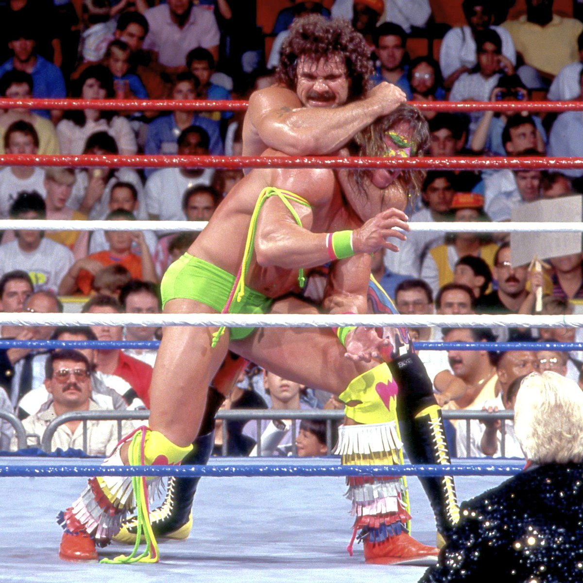 WWFWrestling1's tweet photo. On this day in 1989: Ultimate Warrior reclaimed the Intercontinental title from Ravishing Rick Rude at SummerSlam. ☀️ #WWF #WWE #Wrestling #SummerSlam #RickRude #UltimateWarrior https://t.co/GQyzeMoyQ5