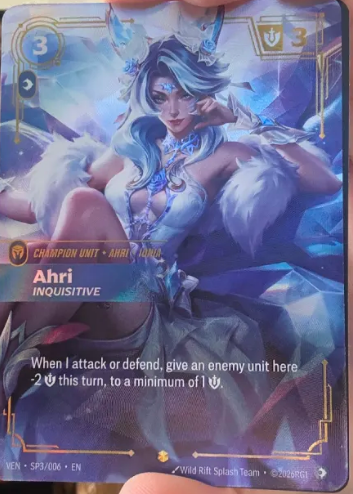 AriesiiShep's tweet photo. Anyway here's my super duper cool Ahri card that I pulled without doxxing myself, bye now! https://t.co/VzmSRPSxpy