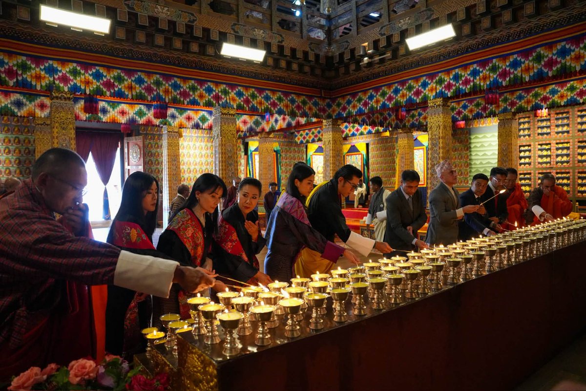 BhutanT's tweet photo. 28 August 2026: His Majesty The King, His Majesty the Fourth Druk Gyalpo, Her Majesty The Queen, and Members of the Royal Family lit a thousand butter lamps at the Grand Kuenrey of Tashichhodzong for the victims of the catastrophic flash floods in Nepal and China. https://t.co/mz3Az1KGgZ