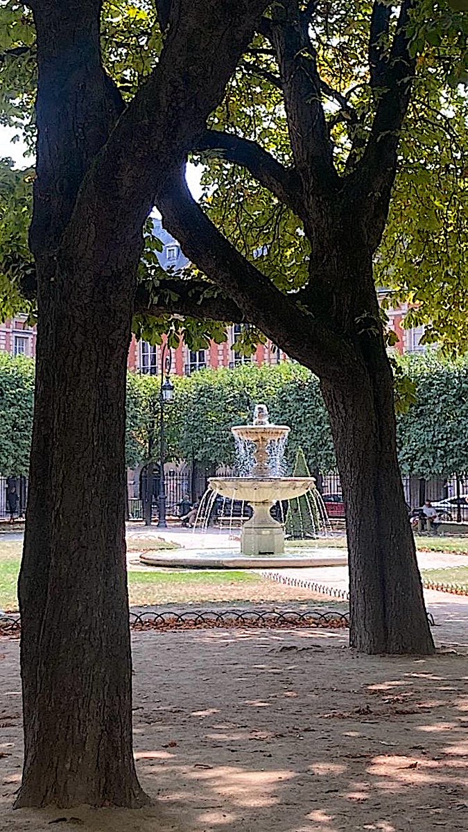 focusonparis's tweet photo. Fountain Friday: a sun-drenched fountain on #PlacedesVosges, through trees. #marais https://t.co/5kcqBtTJe2