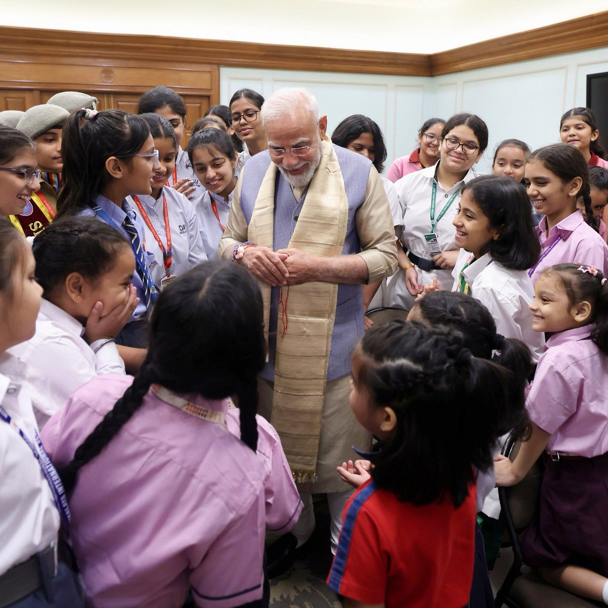 narendramodi's tweet photo. High fives, smiles and more during today’s Raksha Bandhan celebrations at 7, LKM. https://t.co/dMTJHxlVhH