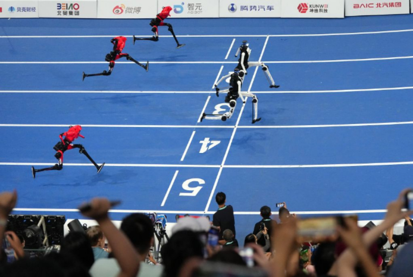 touch_beijing's tweet photo. More than 2,000 #humanoidrobots competed at the World Humanoid #RobotGames (2026) in #Beijing. Humanoid robots completed the 100-meter dash in under 10 seconds and jumped as high as 3.4 meters. https://t.co/5EKzZDJ21K
