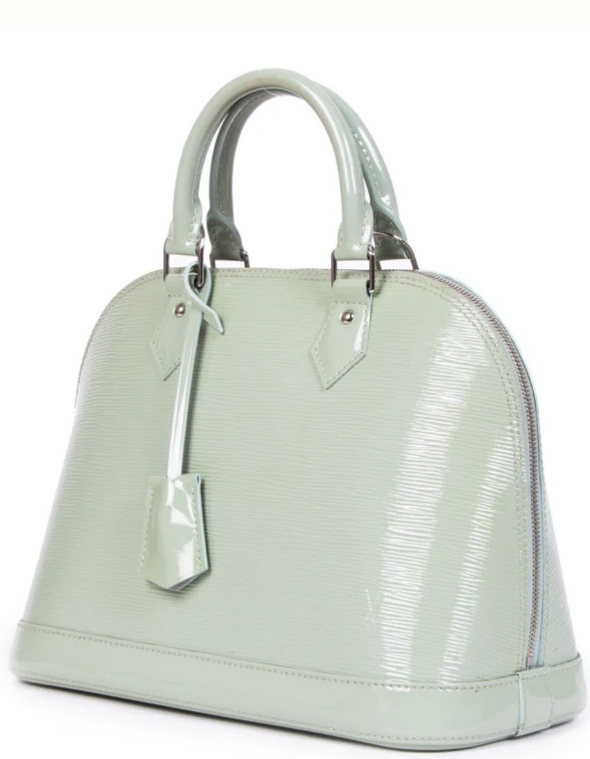 trinversee's tweet photo. Trinity's Louis Vuitton mint green epi leather alma pm is to die for https://t.co/18Bh0MnFmv