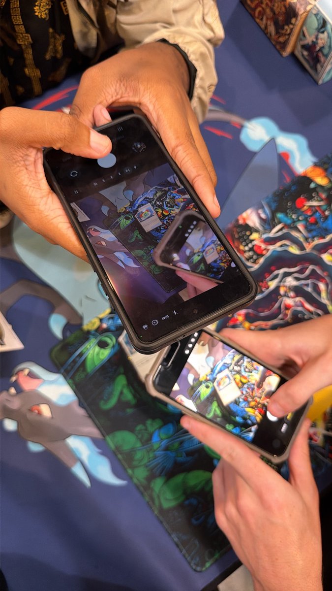 highqualitytcg's tweet photo. @Quakeja_ taking a picture of @Neanckle66 taking a picture of the play stamp holo pokepad tyler took a bite out of https://t.co/erbWabRctV