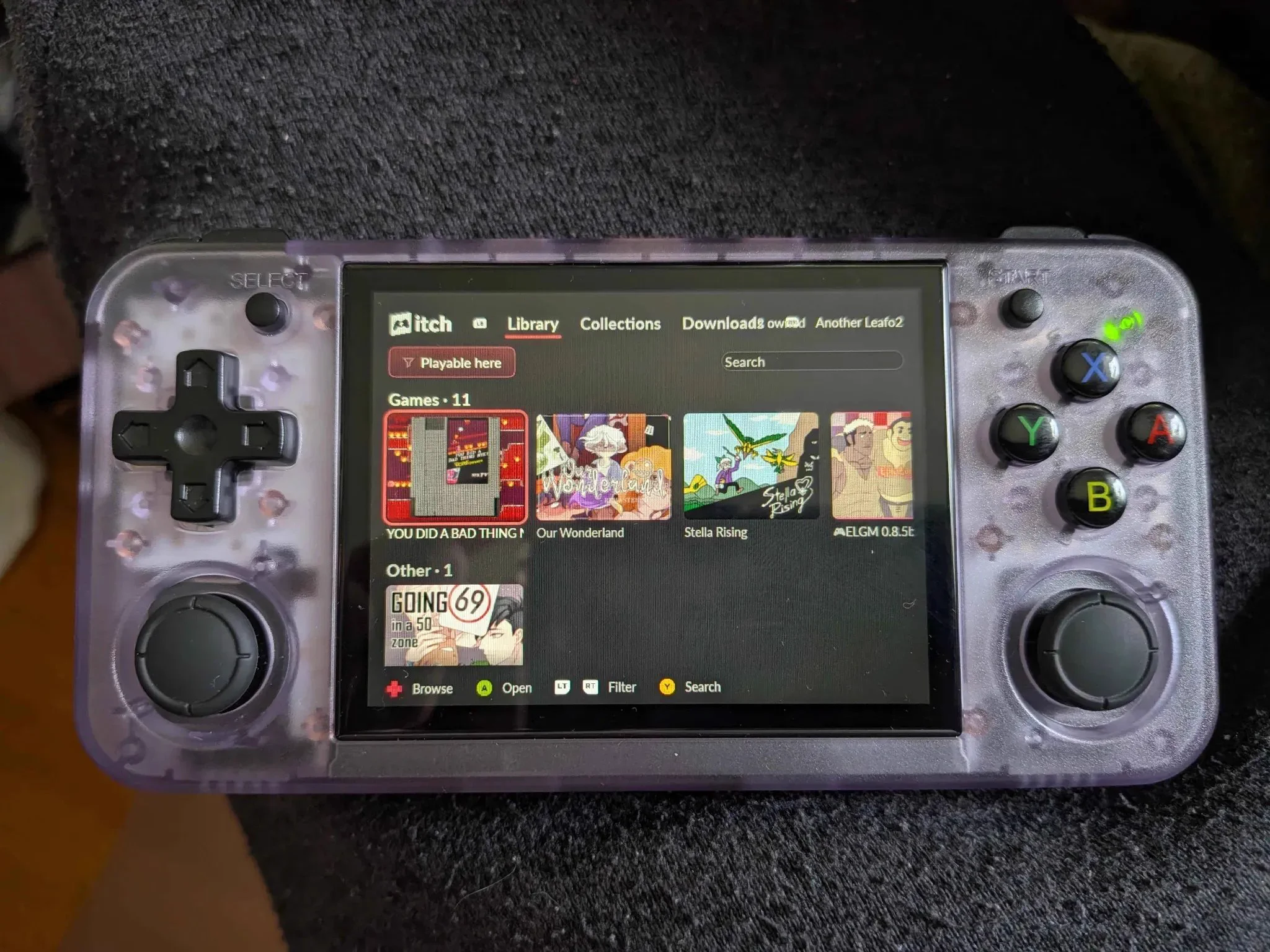 Photo of a janky itch app running on an Anbernic RG35XX H