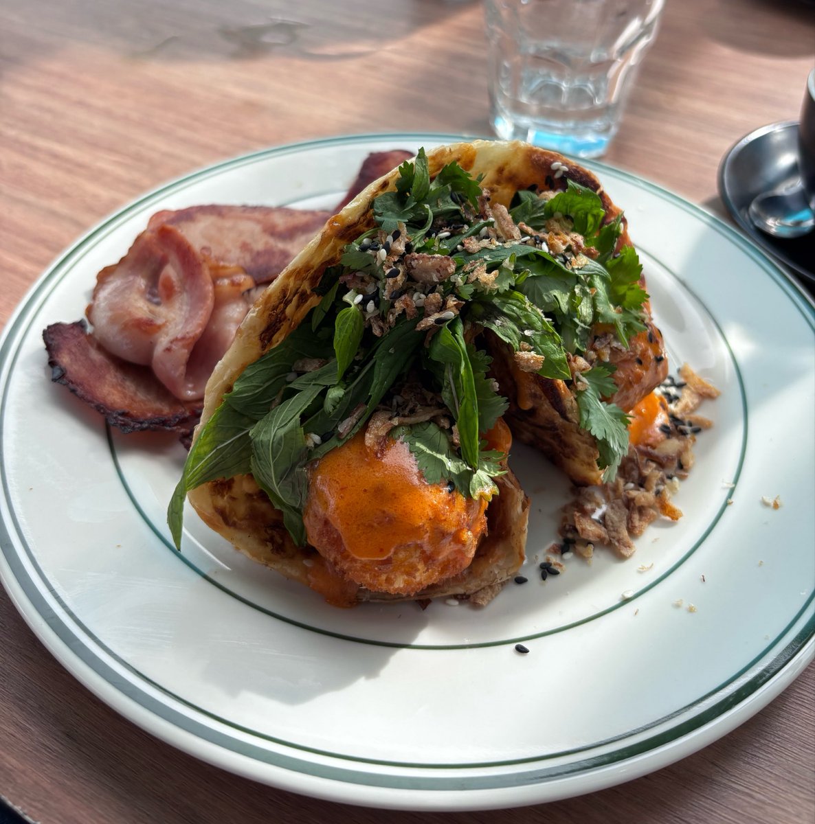 Gator5m's tweet photo. @0ctoberexic Cheat meal from months ago, fried eggs in paratha with a side of bacon https://t.co/SasRyNv4oe