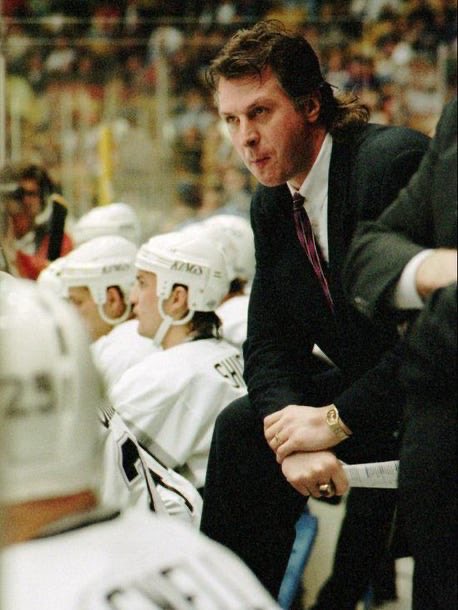 BringHockeyBack's tweet photo. RIP Barry Melrose. 😢 

Remember watching this guy coach 99 and the Kings back at the old Great Western Forum. Long live the black and silver mullet. https://t.co/D2bkmFUAag