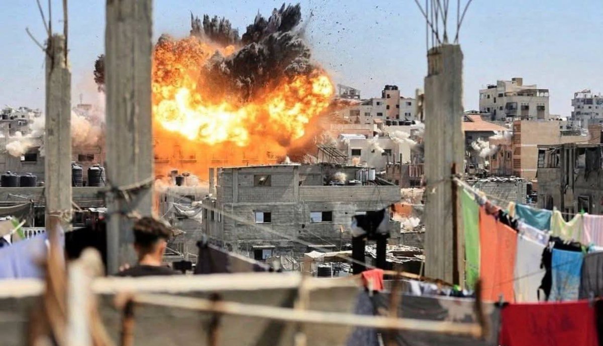 PalPress24's tweet photo. The moment Israeli aircraft destroyed a home in Nuseirat refugee camp, central Gaza. https://t.co/2s6RgE5BsJ