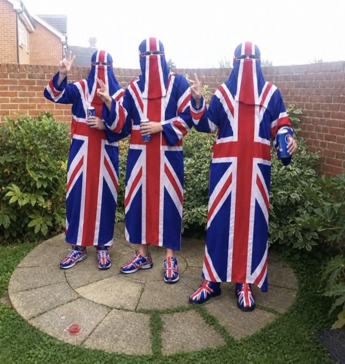 RogueUnfiltered's tweet photo. I’ve found the solution. 

Not black coverings but
Wearing our country with pride 🤣🤪 https://t.co/nCglrYZWAH