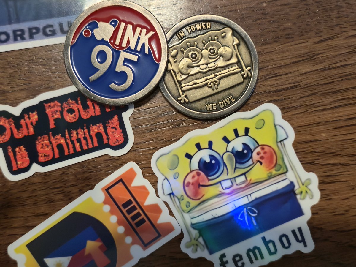 Ink95Team's tweet photo. Come find Ink-95 and get some freebie stickers and our limited edition femboy SpongeBob coin! (While supplies last) #Riptide2026 #Splatooncomp #Splatoon3 https://t.co/1EM0RA4Rxp