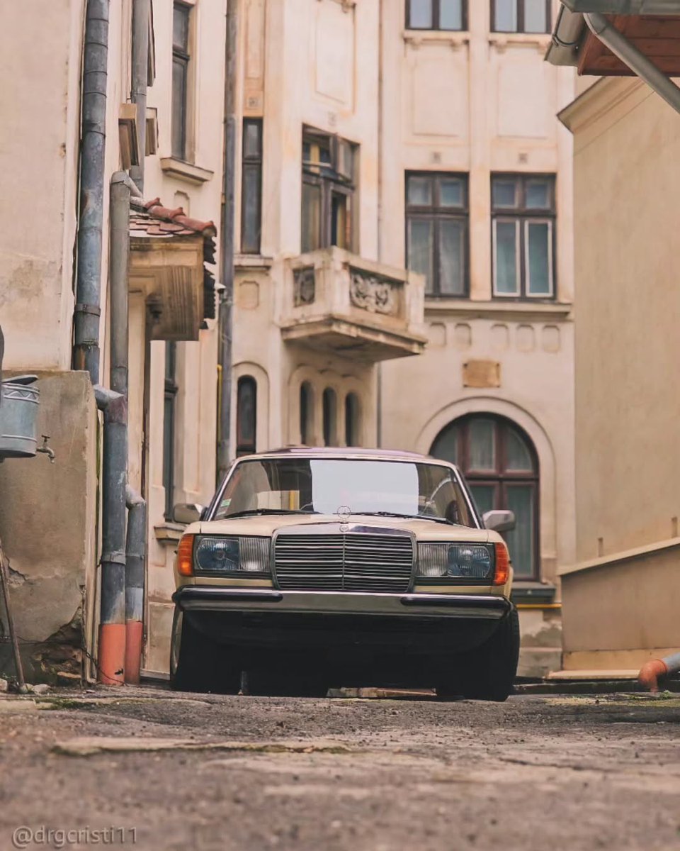 LeesaBassi6inc's tweet photo. A Mercedes W123 by old walls—decades of change, stories, and quiet reliability. Not about speed or trends, but presence and memories. Honest engineering and timeless simplicity make it a familiar companion wherever you park. https://t.co/wEOWMlsrvk