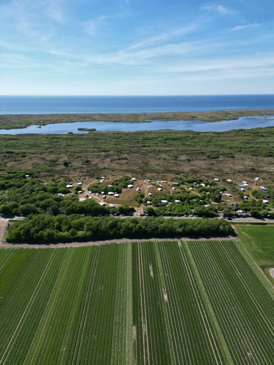 EliasRabel3i's tweet photo. A beautiful overview of the campsite, filmed by Norbert with a drone. We’re that little white dot at the bottom. https://t.co/bHHulBvUA4