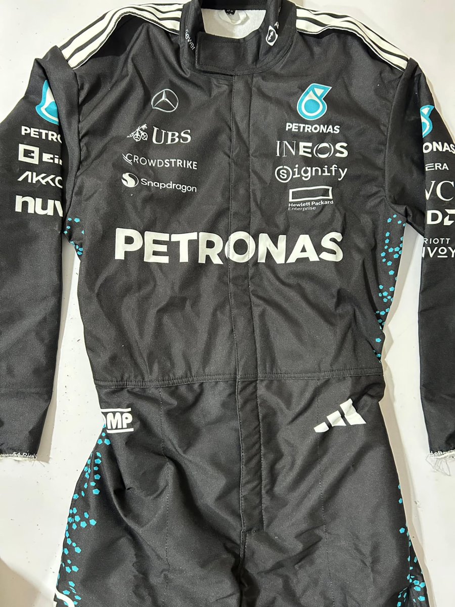 AlyseIrishpv's tweet photo. Mercedes F1 Petronas George Russell 63 2026 model. Get your own custom suit made by us. https://t.co/GUft8Rp7Bw