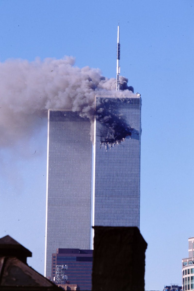 25YearsAgoLive's tweet photo. Windows have been shattered across the North and South Towers of the World Trade Center by the blast a few minutes ago, and workers in the South Tower report feeling physical heat from hundreds of feet away. There is even smoke in the South Tower.
Nevertheless, public address announcements are ordering workers not to evacuate and return to their desks, as the fire only concerns the North Tower.