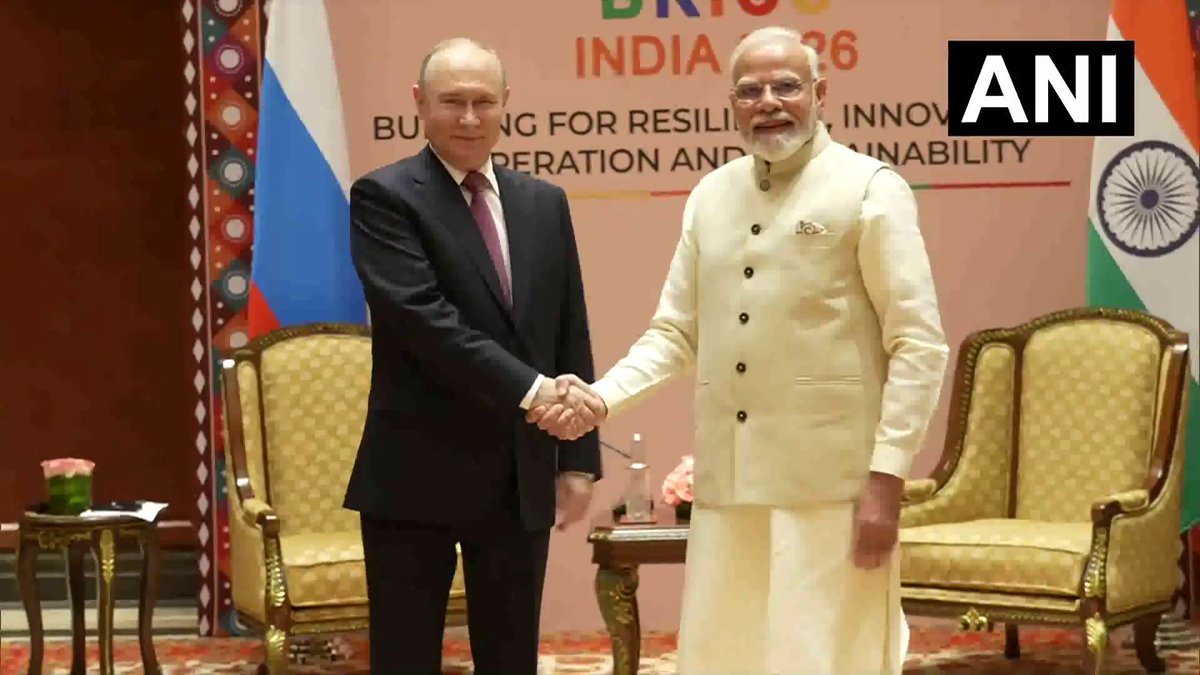ANI's tweet photo. Delhi: Prime Minister Narendra Modi and Russian President Vladimir Putin hold a bilateral meeting on the sidelines of BRICS Summit 2026. 

(Pics Source: DD News) https://t.co/a0qz8AZNna