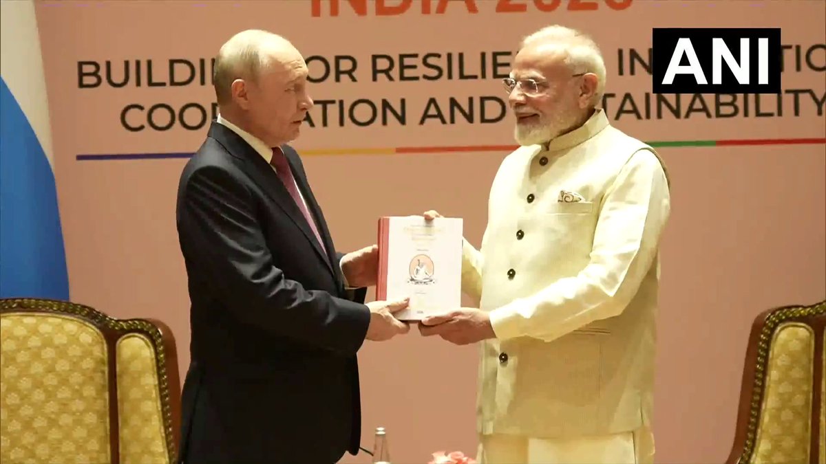 ANI's tweet photo. Delhi: Prime Minister Narendra Modi and Russian President Vladimir Putin hold a bilateral meeting on the sidelines of BRICS Summit 2026. 

(Pics Source: DD News) https://t.co/a0qz8AZNna