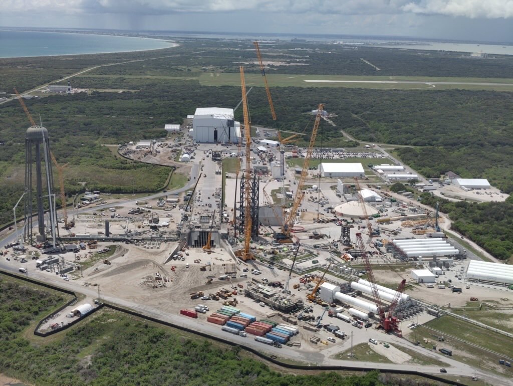 outerspacetoday's tweet photo. NEW: Blue Origin CEO Dave Limp has shared a before-and-after look at New Glenn’s launch pad as crews work around the clock to rebuild after the May 28 test explosion.

The drone images (pictured) compare May 29, one day after the accident, with this week at Launch Complex 36 in Florida.

The rebuild includes a change in how New Glenn reaches its launch position: crews will assemble the rocket’s stages horizontally, then use a crane to raise it upright at the pad before attaching the payload.

Blue Origin has said it aims to resume New Glenn launches before the end of 2026.