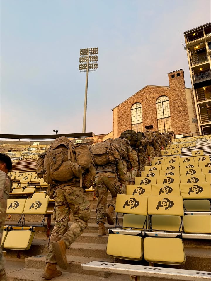 CUBoulder's tweet photo. On the 25th anniversary of 9/11, we remember and honor the fallen heroes. This morning, Army, Air Force, Navy and Marine ROTC cadets joined together with first responders from @CUBoulderDPS, @boulderpolice and @boulder_fire for a memorial stair climb in Folsom Field. https://t.co/7mxPkm1qv7