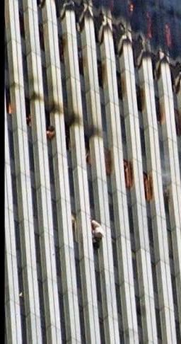 25YearsAgoLive's tweet photo. Three people attempt to climb down from the 79th floor of the South Tower, emerging from window 79-351 and using a makeshift rope. But they slip and fall. 

Firefighter Danny Suhr is struck by one of them, killing both people instantly. 

These are the first people seen falling or jumping from the South Tower; at least 50 people have fallen or jumped from the North Tower.