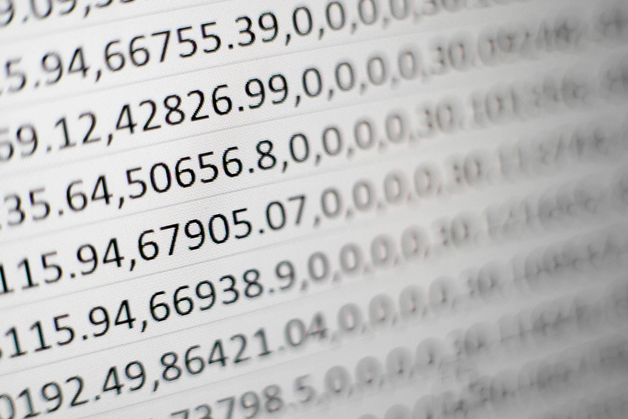 Photograph of printout of numbers. Credit goes to Mika Baumeister via Unsplash