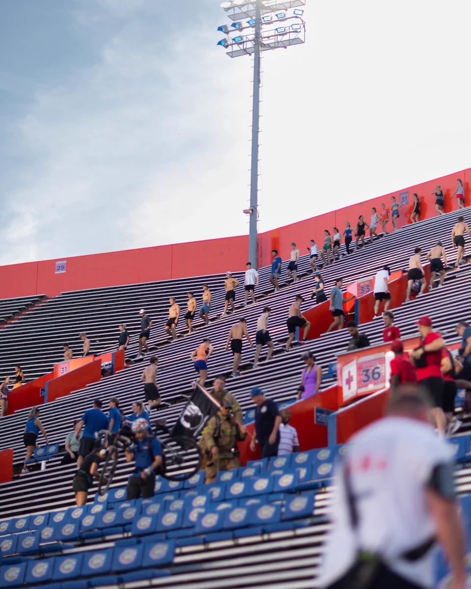 People walking up and down the steps in Ben Hill Griffin Stadium
