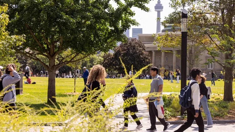 Students walking across King’s College Circle