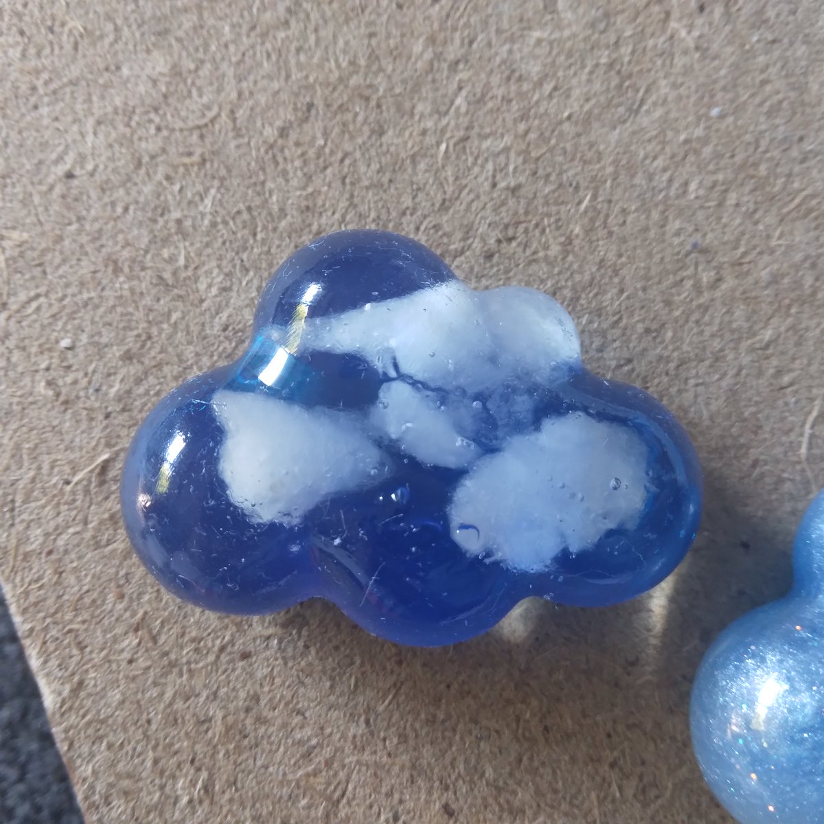 rimha716's tweet photo. A new cloud has been made! Would you have either of these clouds on the back of your phone as a phone holder...thingy? Or perhaps as a keychain? ꉂ(≧▽≦)
(I messed it up a little bit but I know better now ^^)
#cloud #cute #resin https://t.co/VkRopR2xkv