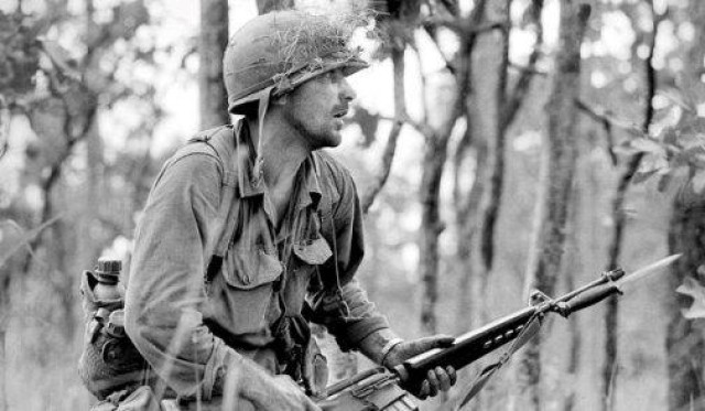 VoicesfromNam's tweet photo. If you own a copy of We Were Soldiers Once... And Young, you are already holding a picture of him. The soldier on the cover, bayonet fixed, coming out of the elephant grass, is Rick Rescorla. Hal Moore called him the best platoon leader he ever saw.

He was born in Hayle, Cornwall, in 1939, a boy who watched American GIs stage through his town before Normandy and decided that was the life. British Parachute Regiment first, then Cyprus, then a uniform from a country he was not yet a citizen of. He joined the US Army in 1963 and by November 1965 he was a lieutenant in the 7th Cavalry in the Ia Drang Valley, the first major battle between American troops and the North Vietnamese Army. His men called him Hard Core. He came home with a Silver Star, a Bronze Star with oak leaf cluster, and a Purple Heart.

Then he became a corporate security director, which is where the story actually starts.

In 1990 Rescorla and an old Vietnam friend named Dan Hill walked the World Trade Center looking at it the way two infantrymen look at terrain. They found the weak point fast. The basement parking garage was wide open. They wrote it up and told the Port Authority that a truck full of explosives could be driven in and parked under the tower. The fix cost money, and it was declined.

On February 26, 1993, a truck bomb went off in that garage roughly thirty feet from the spot the two of them had circled.

Most people would have taken the vindication. Rescorla took the next step. He told Morgan Stanley the building was still a target and that they should get out of it entirely. The lease ran to 2006, so the answer was no. So he did the only thing left to him, which was to assume the attack was coming and train for it.

Every three months, no warning, he ran a full evacuation of every Morgan Stanley floor in the South Tower. Everyone went, down the stairwells, two abreast, at a pace he set. Senior executives went too, and he did not care that they hated it, and they did hate it. Traders being pulled off desks by a 60-year-old Cornishman with a stopwatch. He timed them. He made them do it again.

8:46 on the morning of September 11, 2001. The North Tower is hit. Over the public address system, the South Tower is told to stay put and return to desks.

Rescorla got on his bullhorn and told everyone to get out.

He was 62 years old. He was near the end of his career and he had every reason to be somewhere else that morning. Instead he stood in the stairwells and moved roughly 2,700 Morgan Stanley employees, plus hundreds of other people, down out of the building. To keep them steady he sang into the bullhorn. Men of Harlech. God Bless America. The Cornish songs he grew up on. Grown adults later remembered the strangest thing about the worst day of their lives was the sound of a man singing in a stairwell.

At 9:03 the second plane hit their tower, above them. Most of his people were already low or already out.

He called his wife Susan. She was watching it on television and she was falling apart. What he said to her was this. Stop crying. I have to get these people out safely. If something should happen to me, I want you to know I've never been happier.

Then he went back up.

He was last seen on the 10th floor, climbing, still going against the flow of people coming down. The South Tower collapsed at 9:59. His body was never recovered.

Morgan Stanley had about 2,700 people in that building. Six of them died. Rescorla and members of his own security staff, who stayed with him.

He spent eleven years telling people that an attack was coming and being told it was too expensive to prepare for. Then he spent the last hour of his life proving he had been right, and making sure it did not matter.