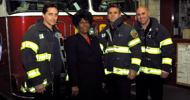 EchoesofWarYT's tweet photo. Twenty five years ago today, six firefighters slowed down for the slowest person in the stairwell, and that is the only reason any of them are alive.

Josephine Harris was 59 years old. A widow and a grandmother from Brooklyn. A bookkeeper for the Port Authority who worked on the 73rd floor of the North Tower.

When the building was hit she started walking down. She was still recovering from an accident and her legs were bad, and she was descending a smoke filled stairwell with thousands of other people. She made it more than fifty floors on her own, which is an achievement most people reading this could not manage on a good day.

Somewhere around the 20th floor she stopped. She could not go any further. She was exhausted and crying and people were flowing past her.

Captain Jay Jonas and Ladder Company 6 were going the other way. They had climbed to the 27th floor when the South Tower came down at 9:59, and Jonas understood immediately what that meant for the building they were standing in. He turned his men around and started them down.

Then they found Josephine Harris.

They could have gone past her. They had every operational justification. The building they were in was going to fall and they knew it, they had their own men to get out, and she could barely stand.

Instead Bill Butler put her arm over his shoulders and they went down at her pace. Step. Rest. Step. Rest. Six firefighters in full gear, descending a skyscraper they expected to lose, at the speed of a 59 year old woman with bad legs.

They got to the fourth floor and she stopped completely. She could not take another step. They were still trying to move her when the North Tower came down at 10:28 in the morning.

One hundred and ten stories collapsed on top of them.

And a short section of Stairwell B, right there in the core, between roughly the second and fourth floors, did not collapse. It held. Fourteen people inside it lived. Jonas and his men, Chief Richard Picciotto, Port Authority officer David Lim, firefighters from other companies, and Josephine Harris.

They were buried, in the dark, listening to the building settle. Bill Butler got a call out to his wife to tell her where they were. After a while the dust began to drift and clear, and sunlight came down through the stairwell from above, which is how they finally understood that there was no longer any building over their heads.

They were pulled out hours later.

Here is the arithmetic those men have lived with ever since. Ladder 6 was moving fast. If they had not stopped for Josephine Harris, they would have been in the lobby or out on the street when the tower came down, and the lobby and the street were killing fields. Her exhaustion held them in the exact place, at the exact minute, where the building chose not to fall.

They had a jacket made for her. It said Josephine, Our Guardian Angel, with the Ladder 6 patch. It is in the 9/11 Museum now.

She stayed close with those men for the rest of her life. When she died in 2011, the firefighters of Ladder 6 carried her casket.

Three hundred and forty three firefighters died that day running toward people they had never met. Six of them lived because they refused to leave one woman behind, and she saved them right back.