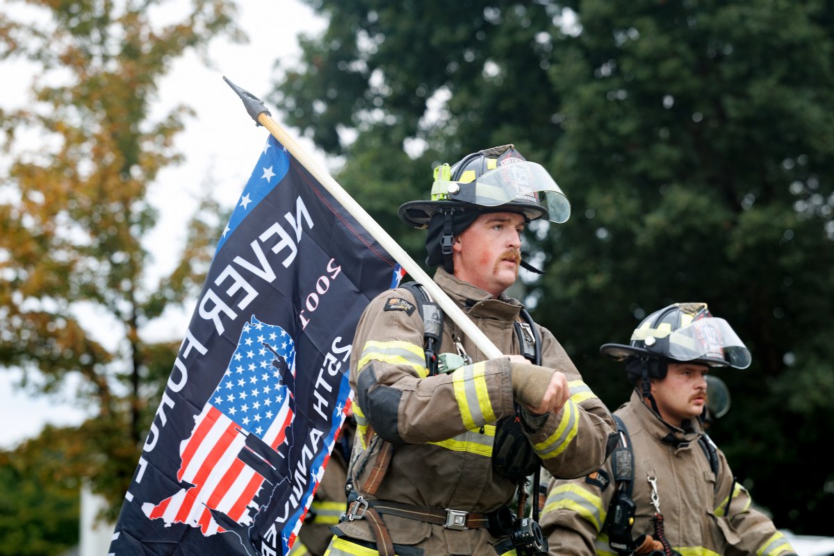utmartin's tweet photo. Our nation was forever changed 25 years ago. 

This morning, the City of Martin Fire/EMS  remembered the lives lost on 9/11 and honored the brave first responders with a tribute walk down University Street. #NeverForget https://t.co/umzF0gQvpS
