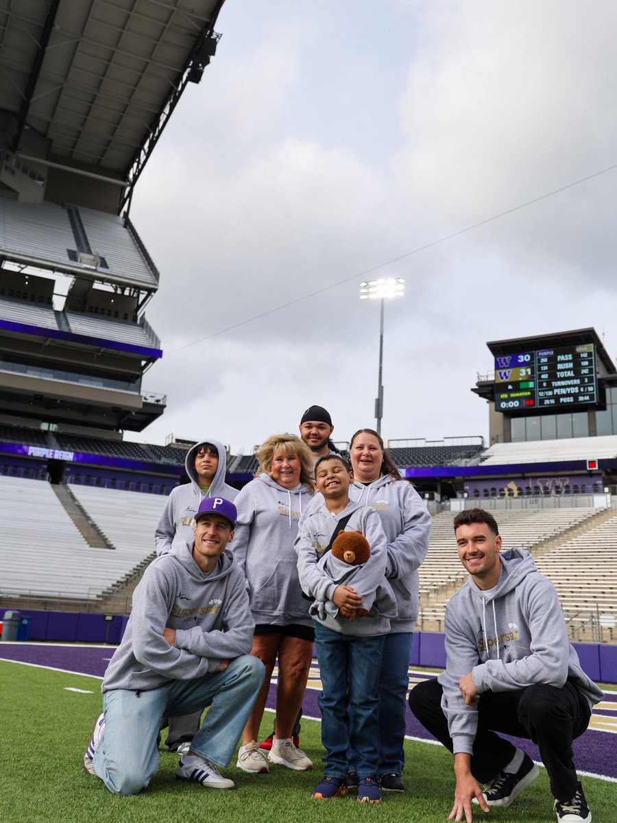 UW_Football's tweet photo. For 8-year-old Asher, teddy bear Beary has been there for every step of leukemia treatment. Diagnosed in 2025 with seven months of frontline chemotherapy ahead of him at @seattlechildren, Asher is doing it all with incomparable energy and a smile, so this week was time for Beary to see what being a Dawg is all about. 

Asher brought his family from Des Moines, Washington, to explore the UW trophy case and test out the Huskies’ recovery equipment. Beary took the day off just to hang with the linebackers in custom HOMS gear,  Heart on My Sleeve (HOMS) a project Porter started while he was a punter for UW Football, and Asher broke in new receiver gloves with his favorite player, Luke Dunne – then showed the whole team his victory dance.

The joy and vivacity Asher showed us today are a testament to his strength, and a gift our Dawgs hope to carry with them tomorrow when they suit up against Utah State.

Today, we’re just proud that this kid — and his bear — are part of the family. Keep fighting, Asher. The Dawg Pack is right behind you. 🐾