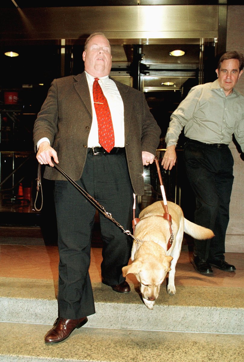 Complex's tweet photo. On 9/11, guide dog Roselle led her blind owner down 78 floors of the World Trade Center to safety.

She guided Michael Hingson through smoke, debris and chaos before leading him to the Fulton Street subway station, where they took shelter from the destruction above. https://t.co/TFNqxSXEeK